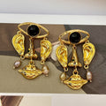 Personalized pearl drop earrings with facial features