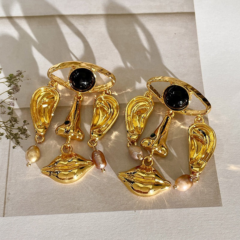 Personalized pearl drop earrings with facial features